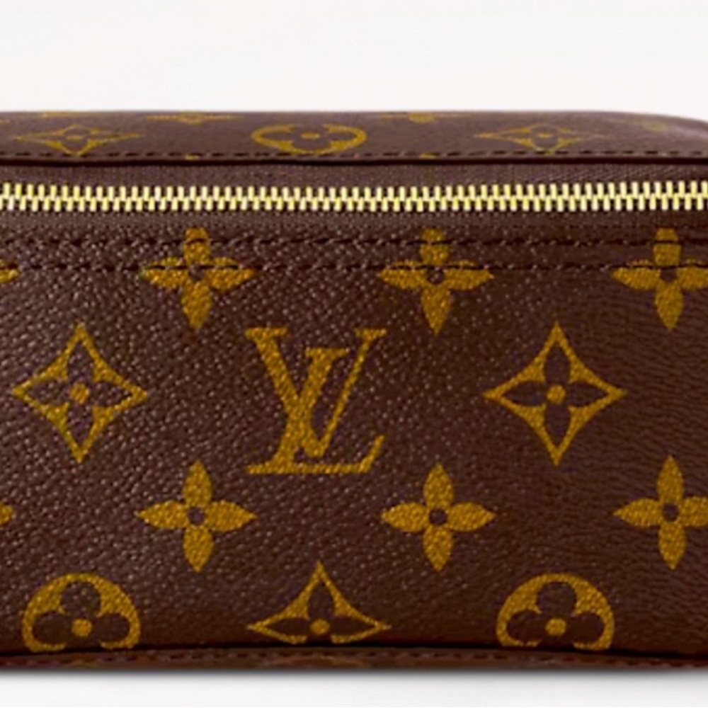 Brand new authentic rare and collectible Louis  Vuitton travel cube with zipper.